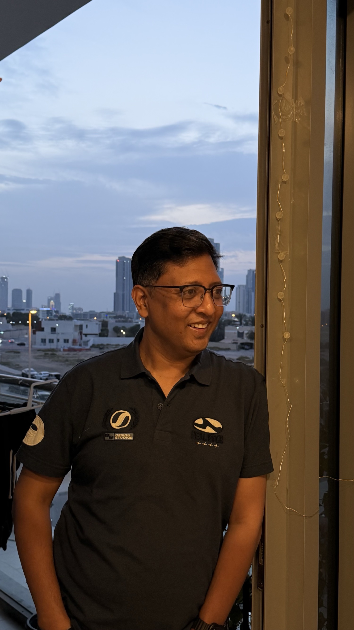 Raja Shahnawaz Soni, on a rooftop in Dubai at dusk